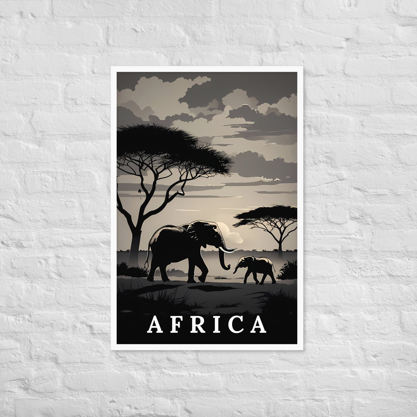 A vertical travel-style poster featuring silhouetted elephants, trees, and a cloudy sky with the word "AFRICA" at the bottom, displayed against a white brick wall.