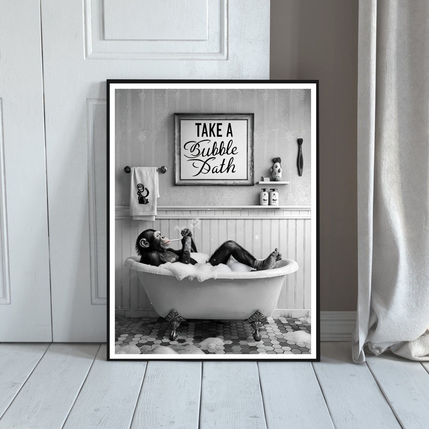 A black and white monkey art print with a sign that says "Take a Bubble Bath"

