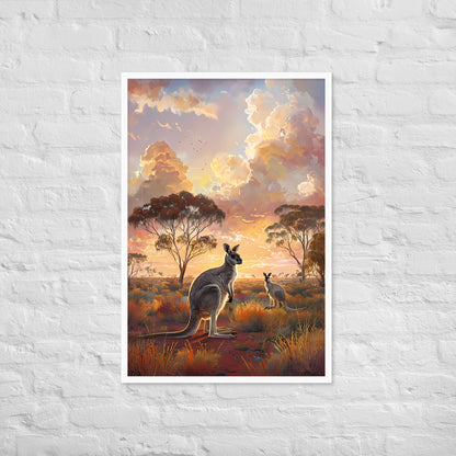 Detailed view of the Australian landscape, highlighting the rich orange-red earth and sparse trees under the sunset.