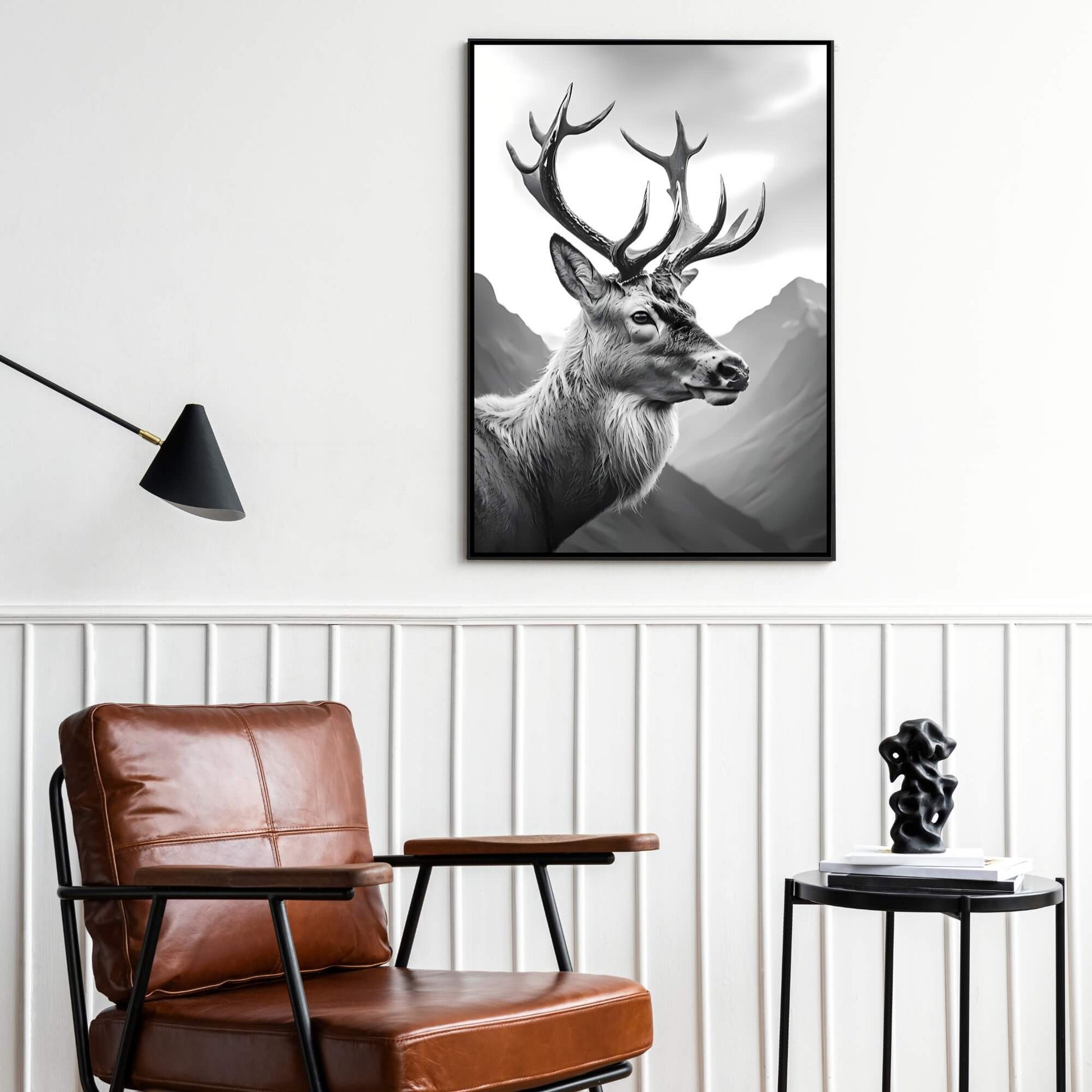 A high-quality print of a majestic stag standing in a dramatic, mountainous landscape.